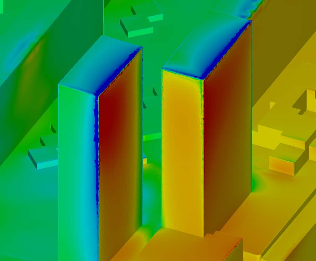 Étude CFD des pressions exercées sur deux tours, conforme au Type Eurocode 1, présentant des simulations de la répartition des pressions du vent et leur impact sur la stabilité des structures.
