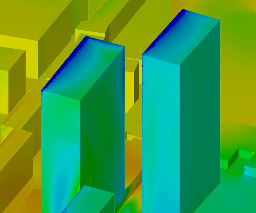 Étude CFD des pressions exercées sur deux tours, conforme au Type Eurocode 1, présentant des simulations de la répartition des pressions du vent et leur impact sur la stabilité des structures.